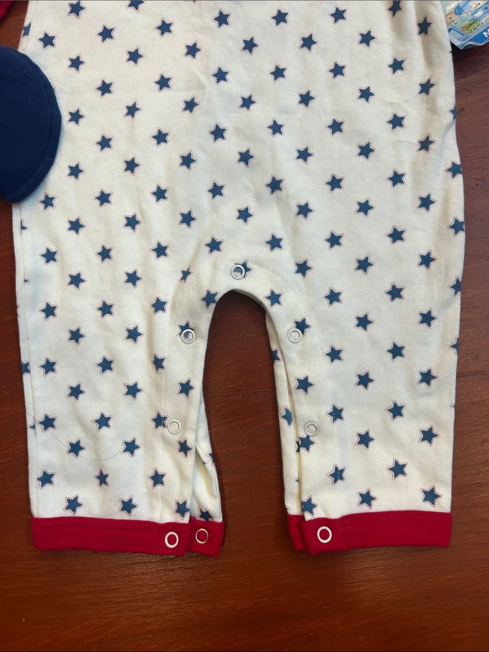 Bon Bebe Cream One-Piece with Navy Stars and Red Trim